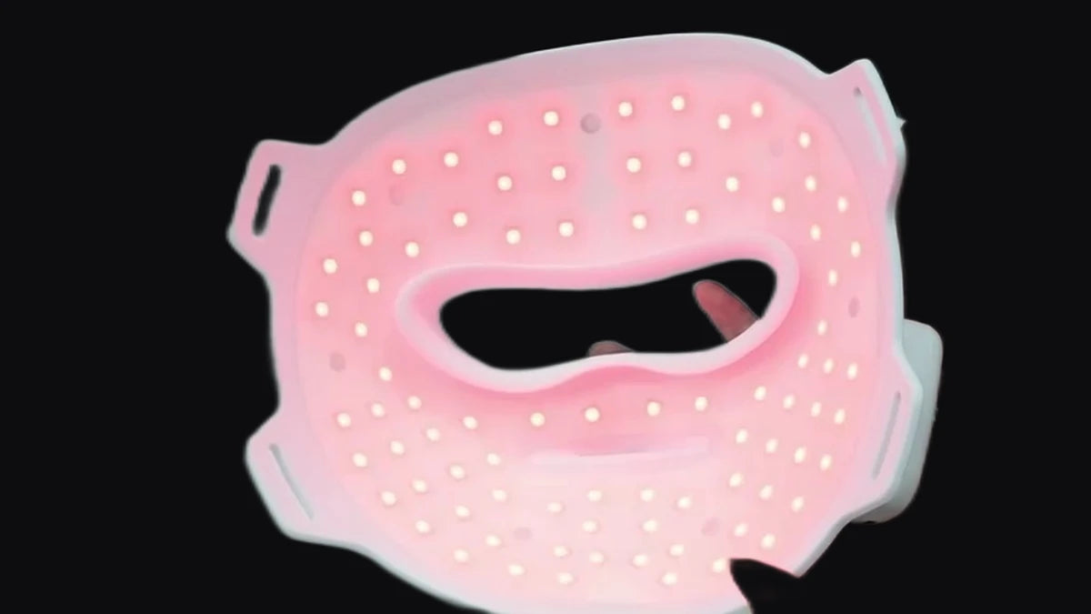 The Sorisse Mask worn, lit with deep red light.